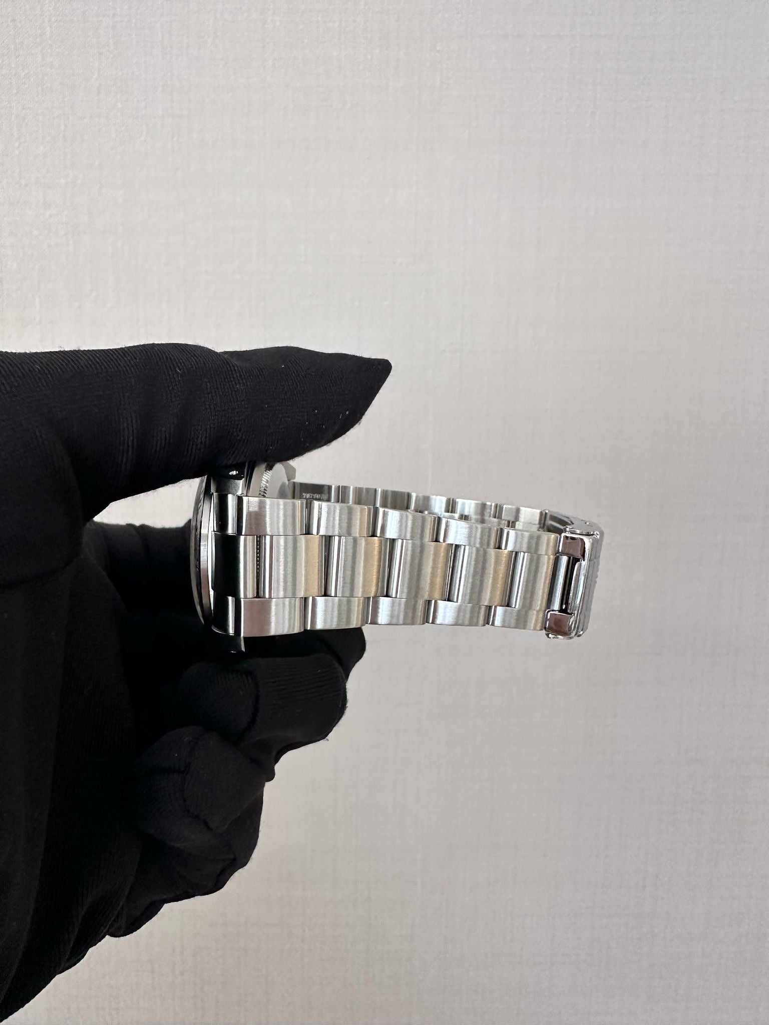 ROLEX 16570 black oyster 12links