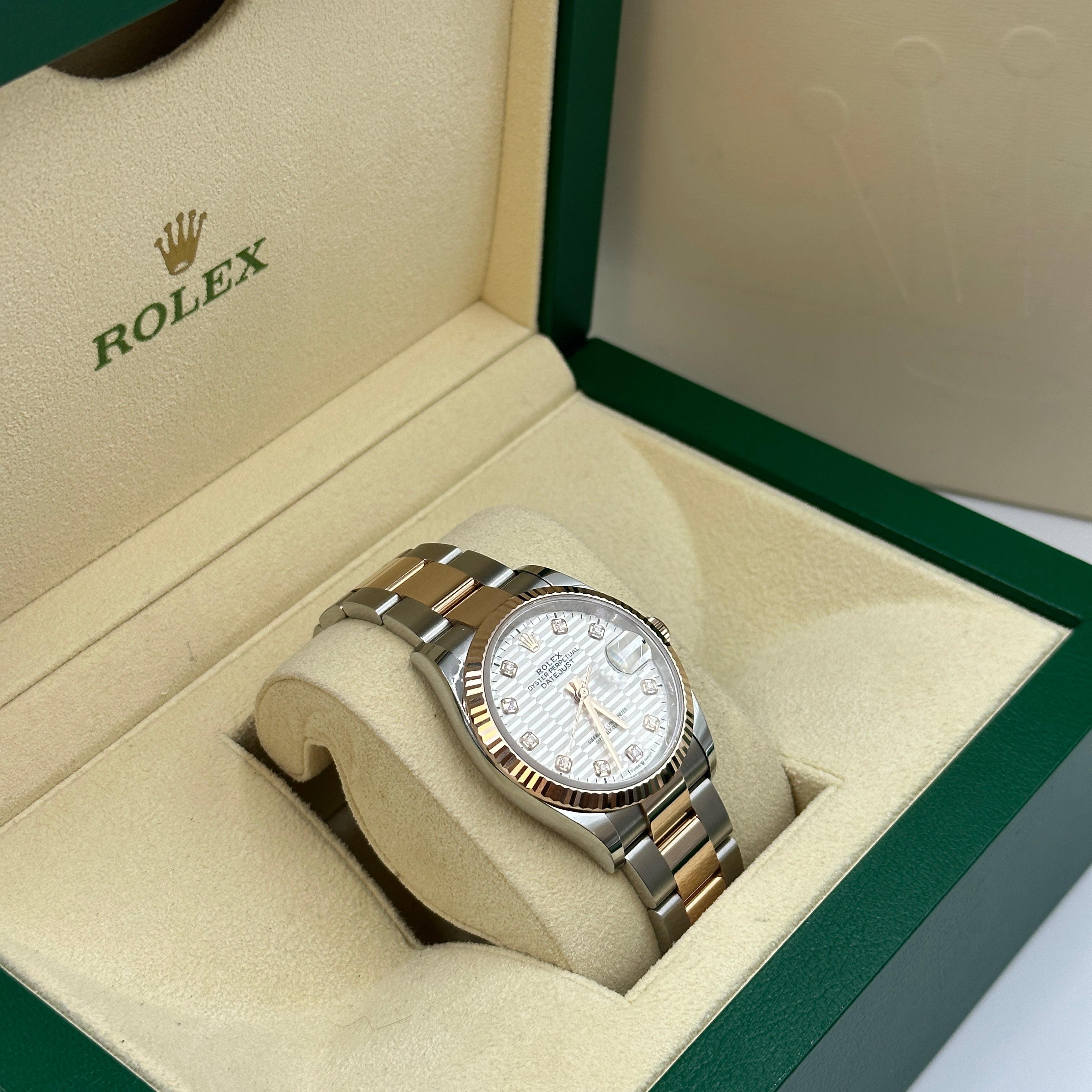 Rolex Datejust 36 126231G Silber geriffelte Oyster 2024