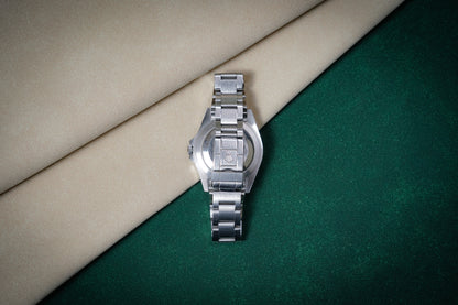 Rolex 16710 black oyster 2007 original paper