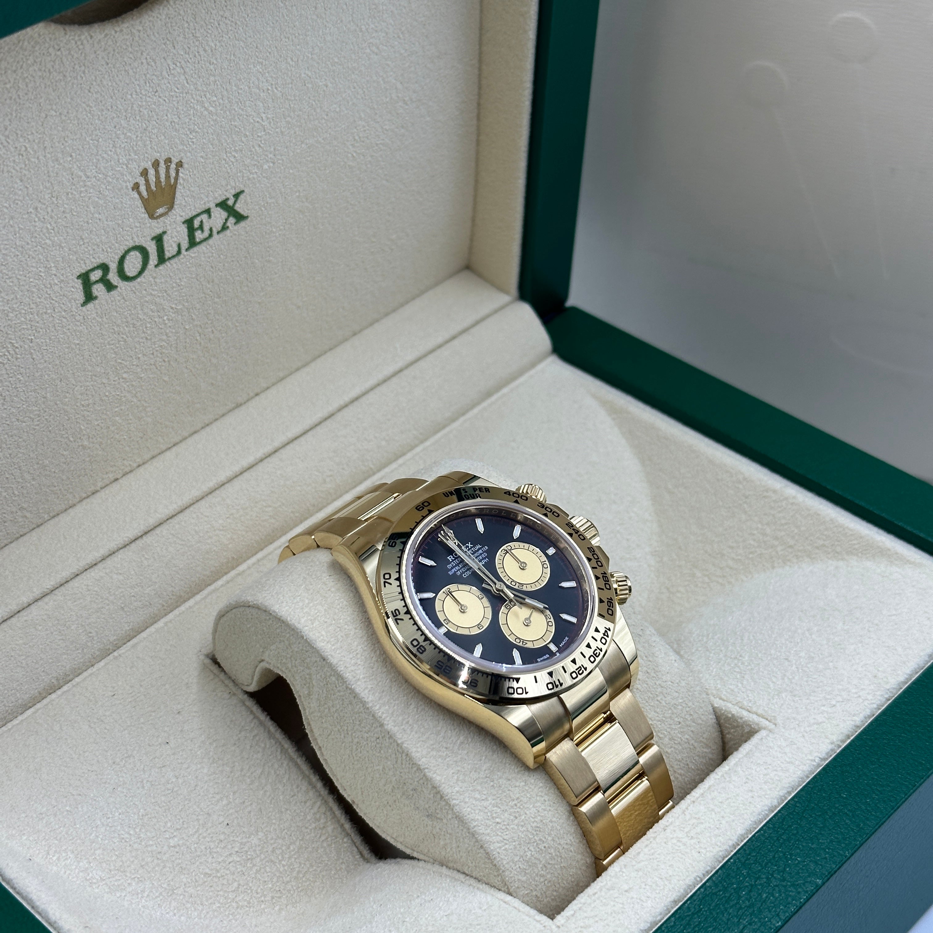 Rolex Cosmograph Daytona 126508 Intensives Schwarz und Champagner