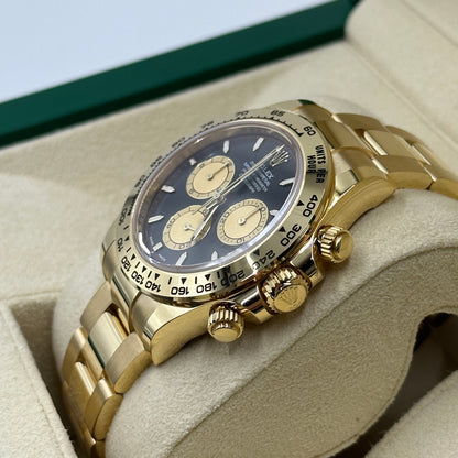 Rolex Cosmograph Daytona 126508 Intensives Schwarz und Champagner