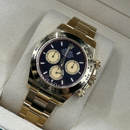 Rolex Cosmograph Daytona 126508 Intensives Schwarz und Champagner