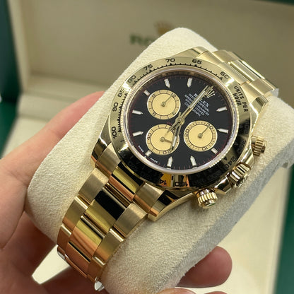 Rolex Cosmograph Daytona 126508 Intensives Schwarz und Champagner