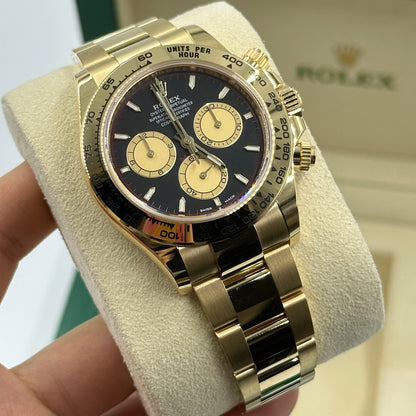 Rolex Cosmograph Daytona 126508 Intensives Schwarz und Champagner