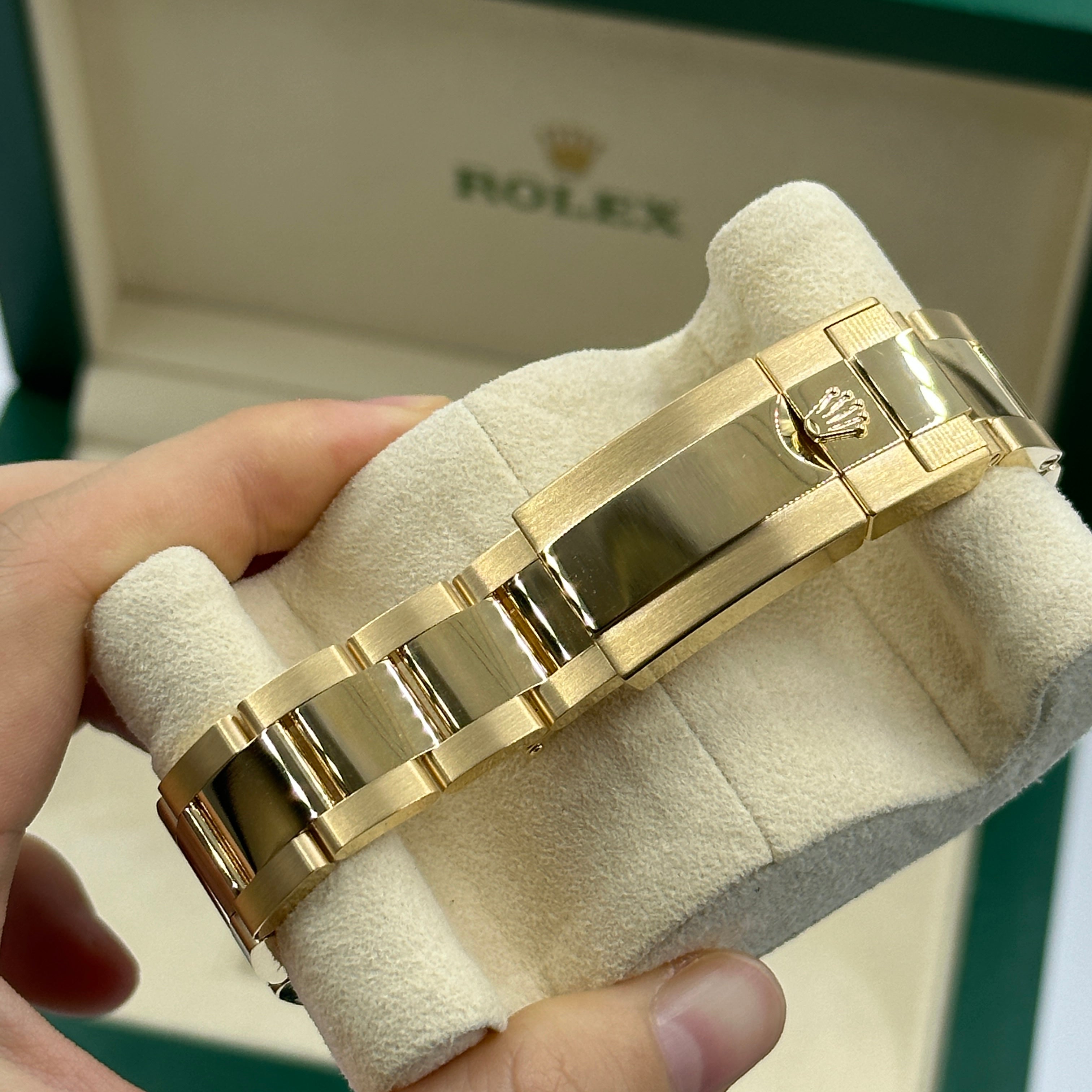 Rolex Cosmograph Daytona 126508 Intensives Schwarz und Champagner