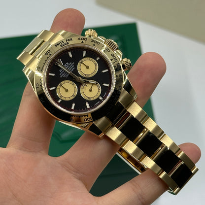 Rolex Cosmograph Daytona 126508 Intensives Schwarz und Champagner