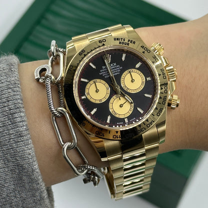 Rolex Cosmograph Daytona 126508 Intensives Schwarz und Champagner