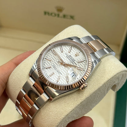 Rolex Datejust 36 126231 Silber Index geriffelte Oyster 2024