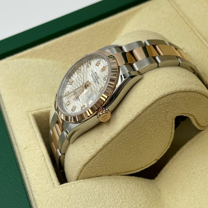 Rolex Datejust 36 126231G Silber geriffelte Oyster 2024