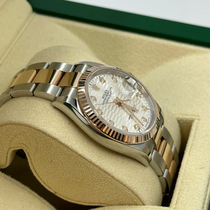 Rolex Datejust 36 126231G Silber geriffelte Oyster 2024