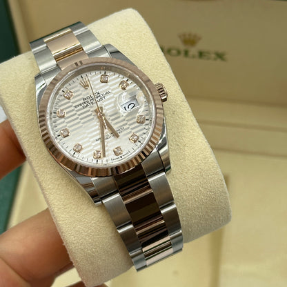 Rolex Datejust 36 126231G Silber geriffelte Oyster 2024