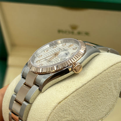 Rolex Datejust 36 126231G Silber geriffelte Oyster 2024