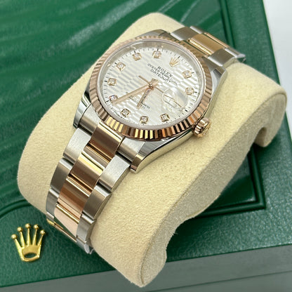 Rolex Datejust 36 126231G Silber geriffelte Oyster 2024