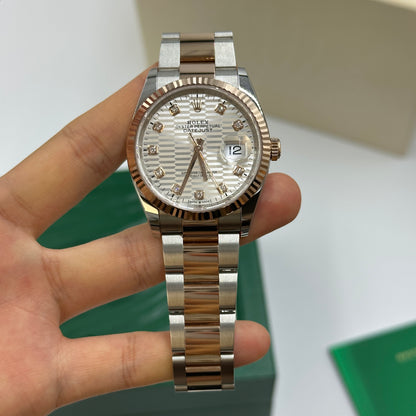 Rolex Datejust 36 126231G Silber geriffelte Oyster 2024