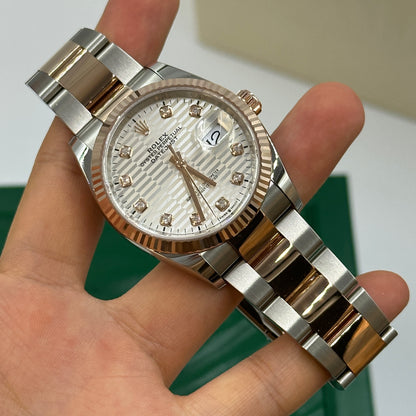 Rolex Datejust 36 126231G Silber geriffelte Oyster 2024