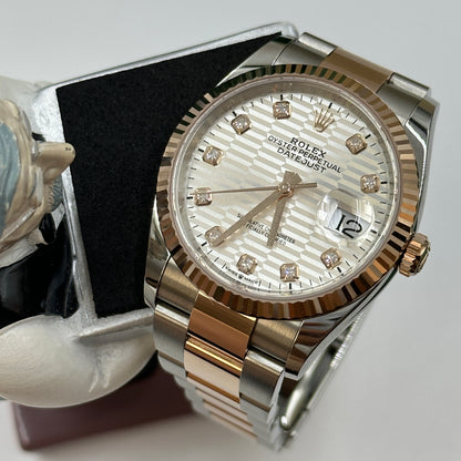 Rolex Datejust 36 126231G Silber geriffelte Oyster 2024